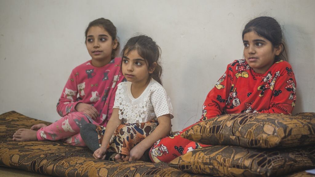 Three of Mo’een Al Ali’s daughters watch on as their parents explain the barriers preventing them from going to school. Photograph: Peter Biro/European Union 2018