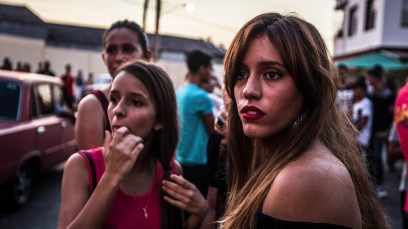 Teenagers wait to enter an event held at La Fábrica de Arte Cubano, a popular hangout for Cuban youth, in Havana. Photograph: Meridith Kohut/The New York Times