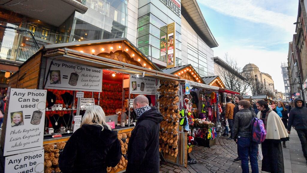 Shoppers at a Christmas Market on Market Street in Manchester. Photograph: Anthony Devlin/Bloomberg