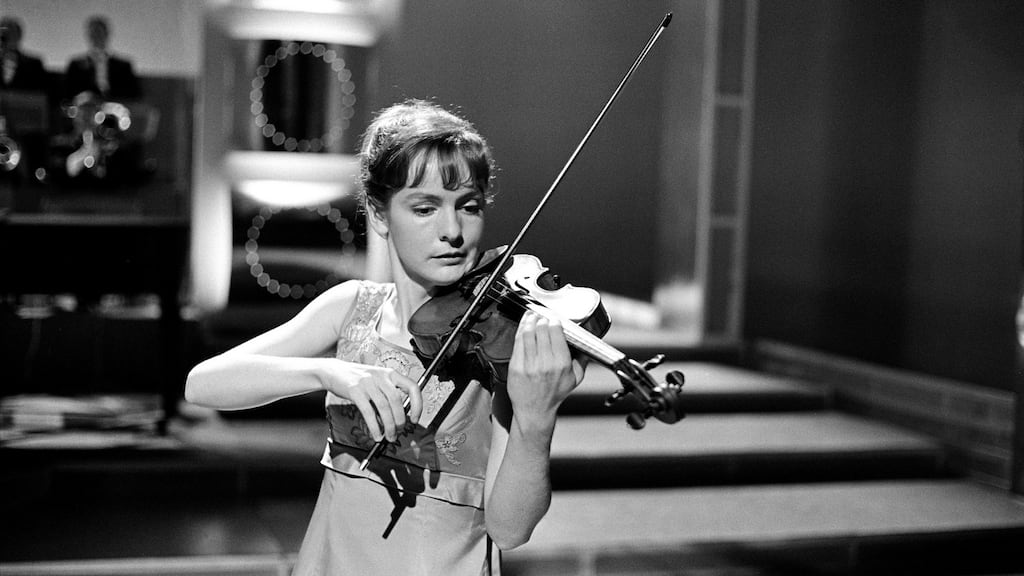 Mary Gallagher in studio, 1967, with the RTÉ Light Orchestra. Photograph: Courtesy RTÉ Stills