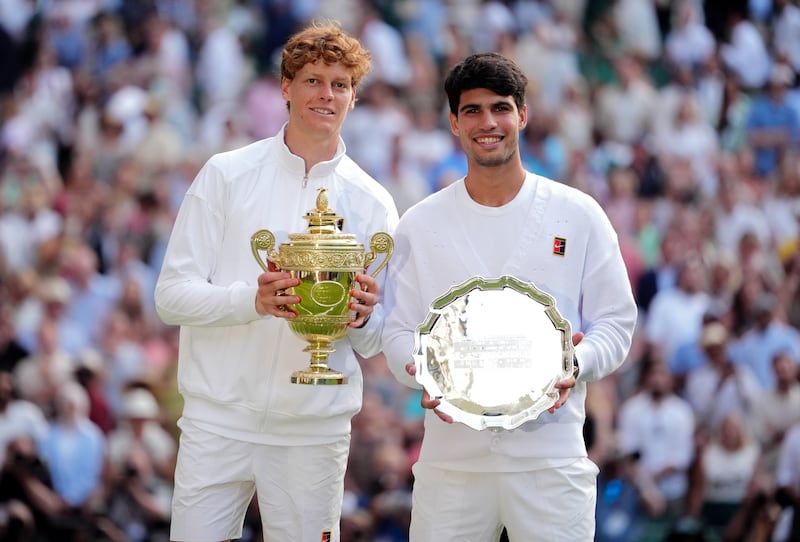 Jannik Sinner (left) with the champion's trophy after beating Carlos Alcaraz in the Wimbledon final in July. Photograph: Adam Davy/PA Wire.