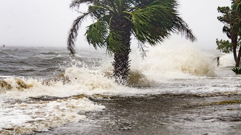 The storm surge and waves from Hurricane Michael batter beachfront homes in the Florida Panhandle community of Shell Point Beach, Florida. Photograph: Mark Wallheiser/Getty Images