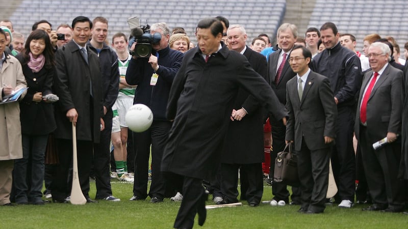 Viral photograph: sports fan Xi Jinping, who is now his country’s president, kicking a football at Croke Park in 2012. Photograph: Alan Betson