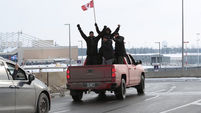 A ‘freedom convoy’ demonstration drives through Ottawa International Airport. Photograph: David Kawai/Bloomberg