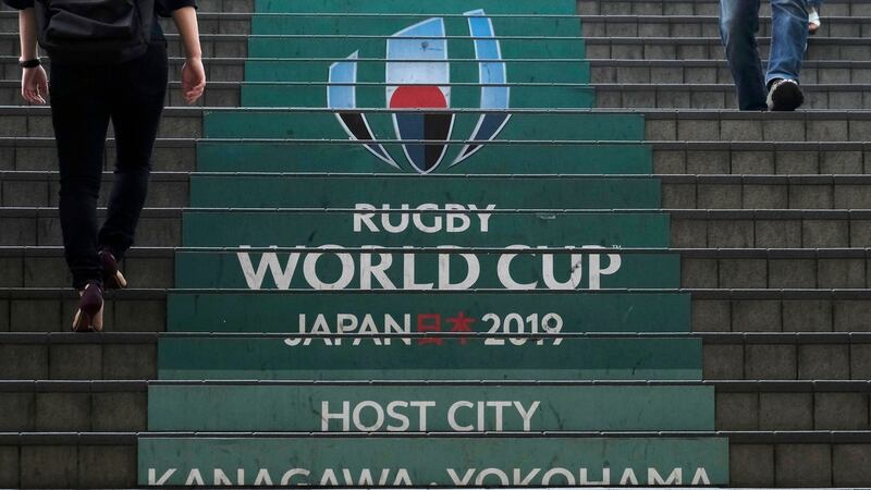 A sign on the steps for the Rugby World Cup logo at an entrance of the Shin-Yokohama railway station in Yokohama. Photograph: Kazuhiro Nogi/ AFP/Getty Images