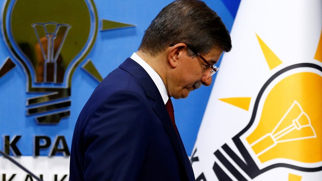 Turkish prime minister Ahmet Davutoglu leaves a news conference at his ruling AK Party headquarters in Ankara, Turkey. Mr Davutoglu had offered only lukewarm support for President Recep Tayyip Erdogan’s vision for a presidential system and his departure follows weeks of tensions. Photograph: Umit Bektas/Reuters