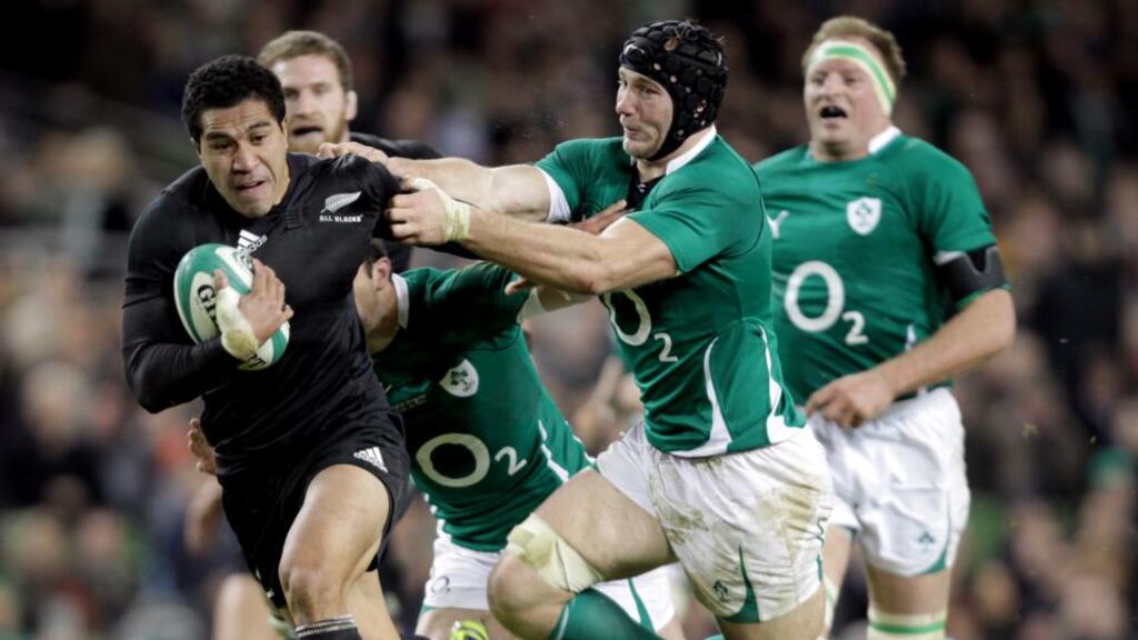Mils Muliaina in action against Ireland’s Stephen Ferris at the Aviva Stadium in 2010. Photograp: James Crombie/Inpho.