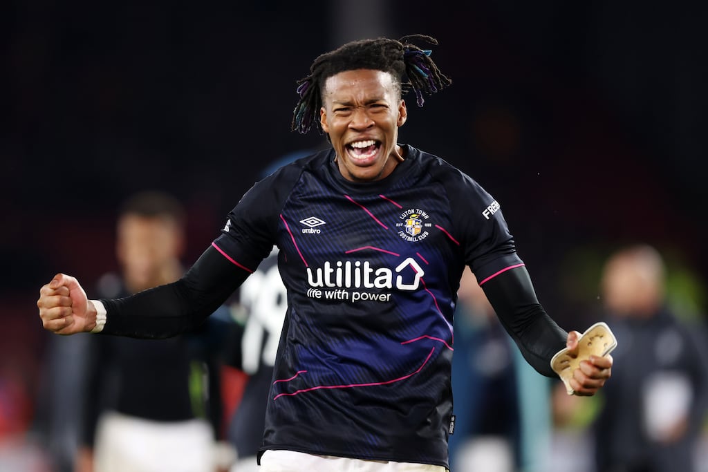 Gabriel Osho of Luton Town celebrates victory at full-time in the Premier League match against Sheffield United at Bramall Lane. Photograph: George Wood/Getty Images