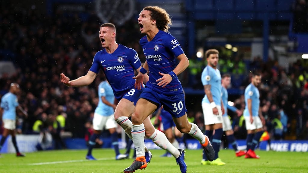 David Luiz celebrates scoring Chelsea’s second against Manchester City. Photograph:  Clive Rose/Getty
