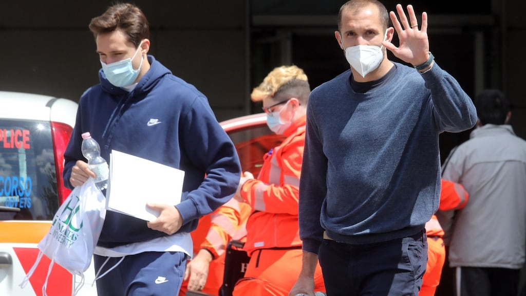 Italian players Federico Chiesa and Giorgio Chiellini arrive for a Covid-19 vaccination at Humanitas hospital in Milan. Photo: Matteo Bazzi/EPA
