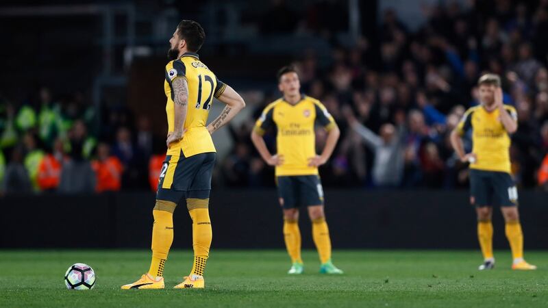 Olivier Giroud stands dejected after Palace’s second goal. Photo: Stefan Wermuth/Reuters