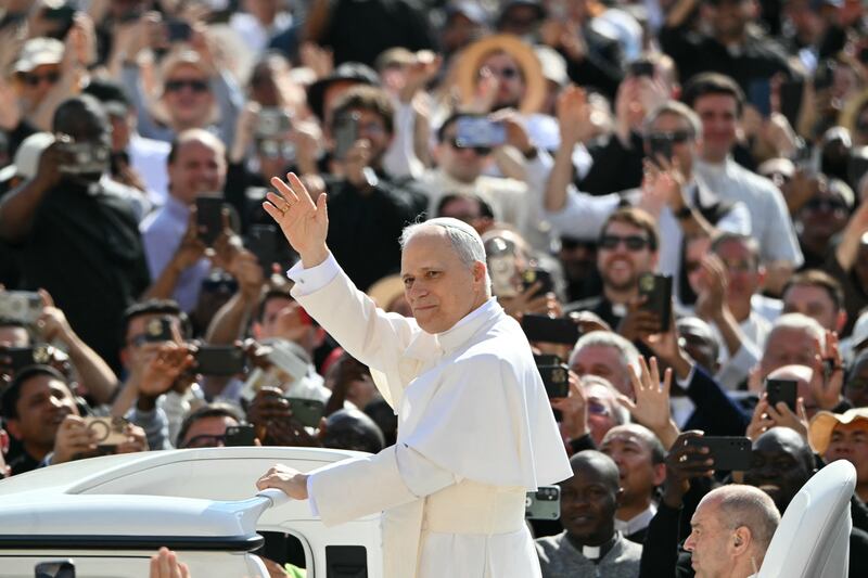 Pope Leo XIV greets the crowd from the popemobile before a Mass for the beginning of his pontificate. Photograph: ALBERTO PIZZOLI/AFP via Getty Images