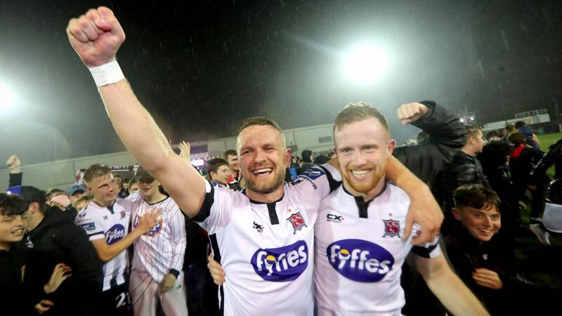 Dundalk’s Dane Massey and Seán Hoare celebrate winning the Airtricity League Premier Division after the game against Shamrock Rovers at Oriel Park in September. Photograph: Ryan Byrne/Inpho