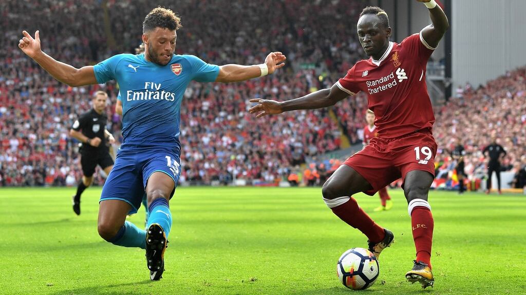 Alex Oxlade-Chamberlain in action for Arsenal against Liverpool’s Sadio Mane on August 27th. Photograph: Michael Regan/Getty Images