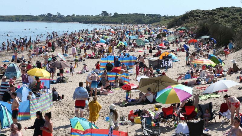 Large numbers of people flocked to beaches around the country on Saturday, including (above) Brittas Bay in Co Wicklow, on the hottest day of the year so far. Photograph: RollingNews