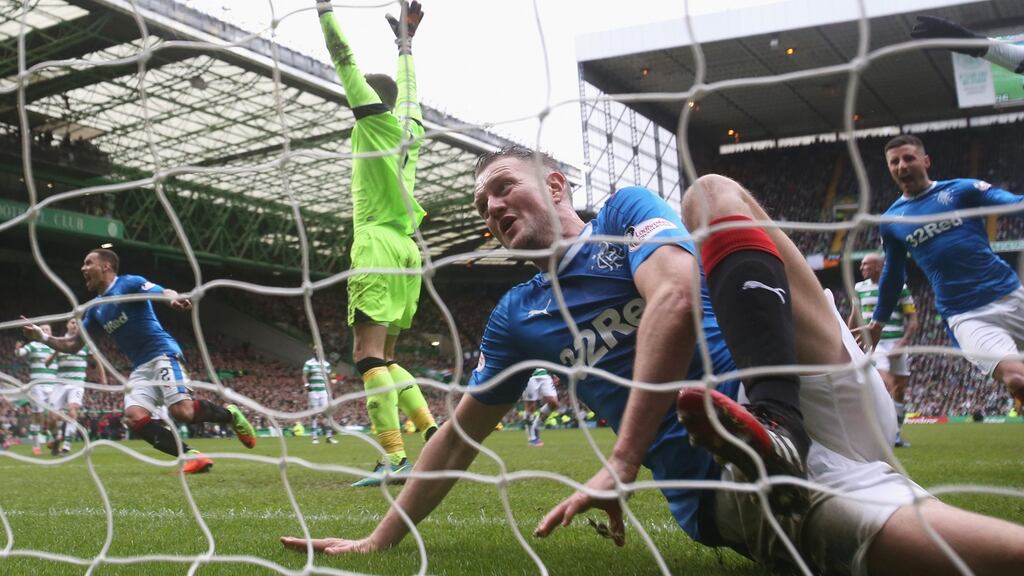 Clint Hill of Rangers celebrates scoring his side’s late equaliser in the Old Firm derby against Celtic at Celtic Park. Photograph: Ian MacNicol/Getty Images