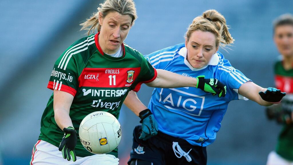 Cora Staunton of Mayo and Dublin’s Fiona Hudson during the Senior Ladies National Football League game at Croke Park last Sunday. Photograph: Gary Carr/ Inpho.