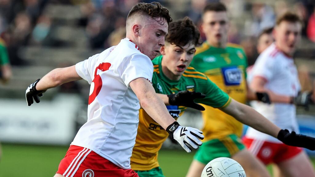 Tyrone’s Eoin McElholm and Cormac Gallagher of Donegal in action at Brewster Park. Photograph: John McVitty/Inpho