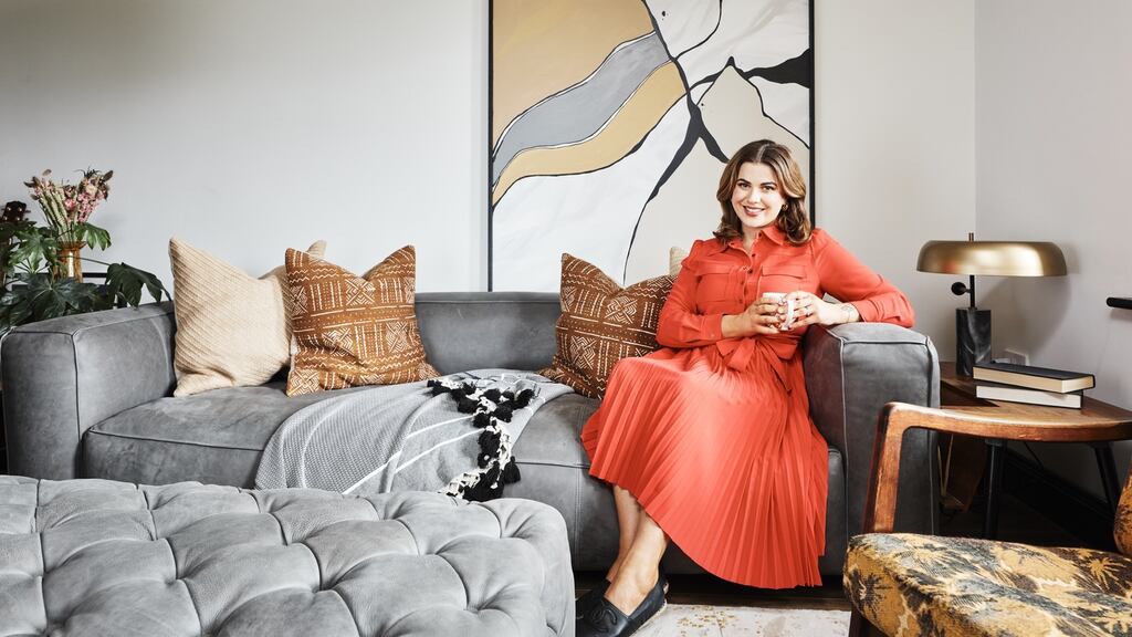 Alannah Monks takes five on her DFS sofa from the Halo Luxe range in her newly decorated, adults-only living room. Photographs: Philip Lauterbach.