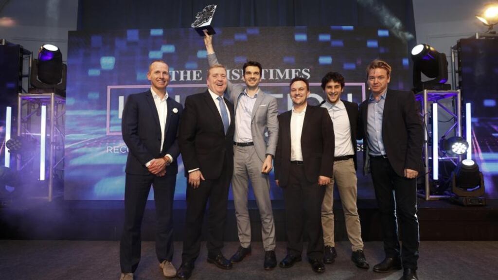 Overall winners: Martin Woods, developer engineer at Aid:Tech; Minister of State for Trade, Employment, and Business, Pat Breen; Niall Dennehy, co-founder of Aid:Tech; Danny Curran, Aid:Tech director of growth; Nicola Paoli, Aid:Tech’s blockchain developer; and Irish Times columnist and MC for the night David McWilliams. The company also won the IT and Fintech category, sponsored by KPMG.