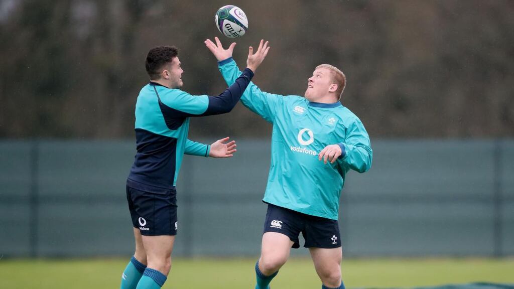 Jacob Stockdale and John Ryan contest the ball during Ireland training at Carton House. Photograph: Dan Sheridan/Inpho