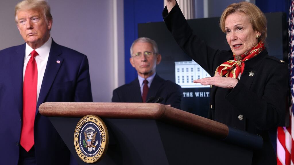White House coronavirus response co-ordinator Debbie Birx with president Donald Trump and Dr Anthony Fauci, director of the US National Institute of Allergy and Infectious Diseases, during the daily taskforce briefing. Photograph: Getty Images