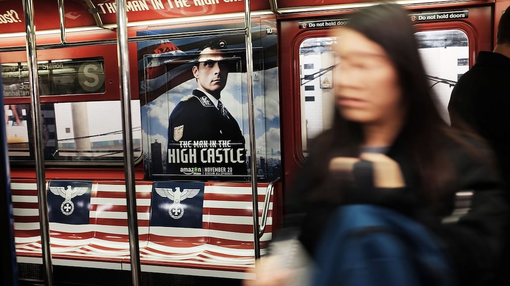 A New York City subway car  covered in Nazi-themed imagery to promote the new Amazon TV series The Man in the High Castle on November 24th, 2015. The advertising is to be removed. Photograph: Spencer Platt/Getty Images