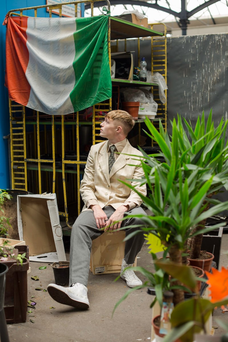 Ivory check suit jacket €6, Dublin Vintage, Capel Street, Dublin 1; nude high-collar shirt €4, Age Action, Camden Street, Dublin 8; geometric tie €2, Age Action; grey suit trousers €10, Oxfam, South Great George’s Street, Dublin 2