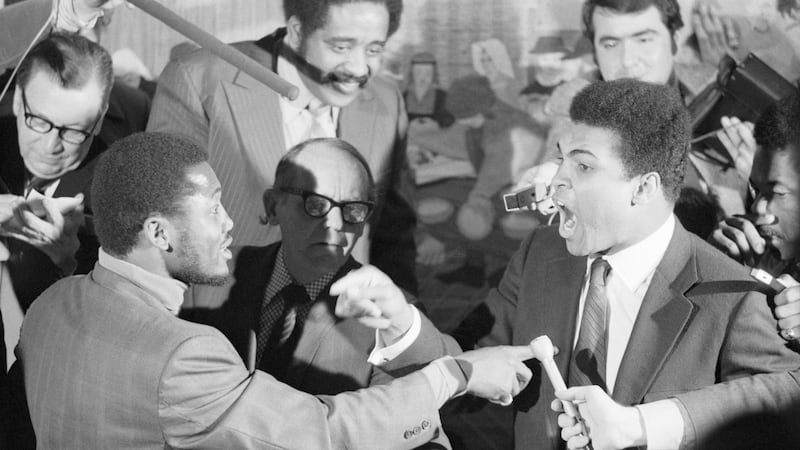 Joe Frazier and Muhammad Ali.