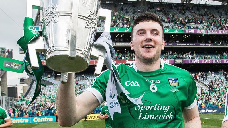 Limerick’s Declan Hannon celebrates after the game with Liam MacCarthy. Photograph: Tommy Dickson/Inpho