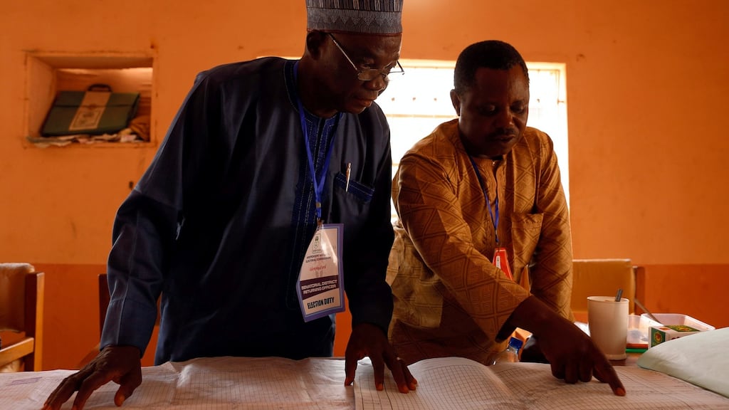 Independent National Electoral Commission  officials collate results from various polling units at the INEC Yola North Local Government Area Office in Adamawa State, Nigeria. Photograph: Nyancho NwaNri/Reuters