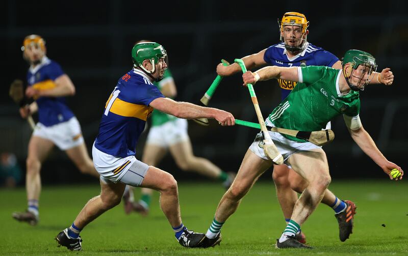 Tipperary's Noel McGrath and Ronan Maher with William O'Donoghue of Limerick. Photograph: James Crombie/Inpho