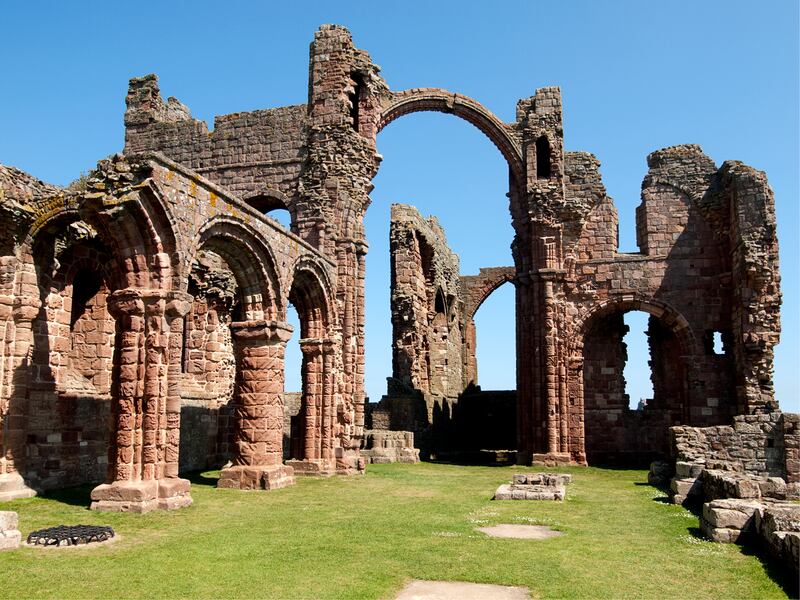 The nave at Lindisfarne Priory church, founded by St Aidan in 635AD. Photograph: Getty