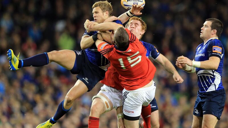 Leinster’s Ian Madigan contests a high ball with Denis Hurley and Sean Dougall of Munster during the Pro12 clash at the Aviva Stadium in 2012. Photograph: Dan Sheridan/Inpho