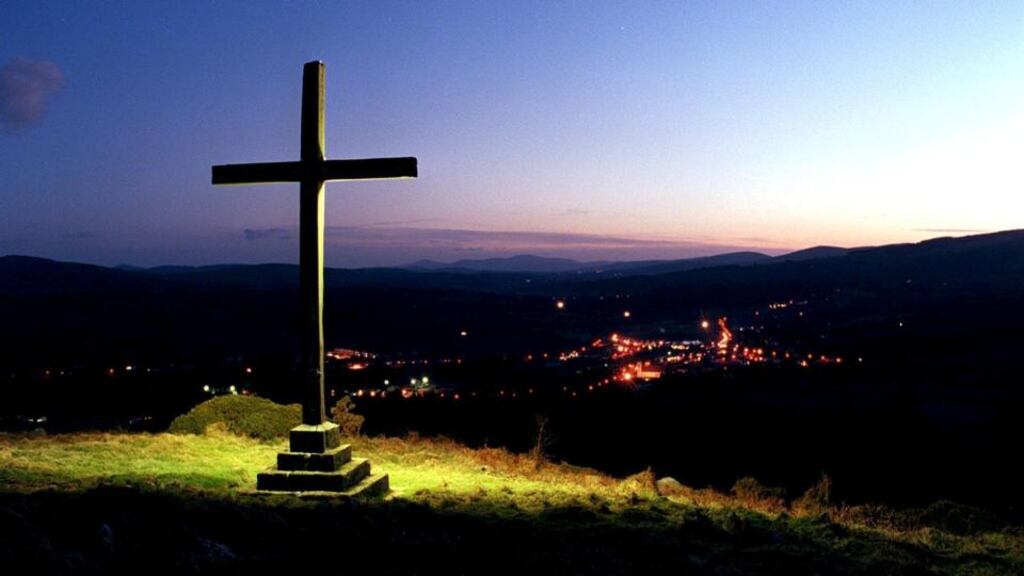 Kerry councillors “tired of apologising for their religion”– cross erected in 1950 and illuminated in 2000, overlooking Aughrim, Co Wicklow. Photograph: Jack McManus.