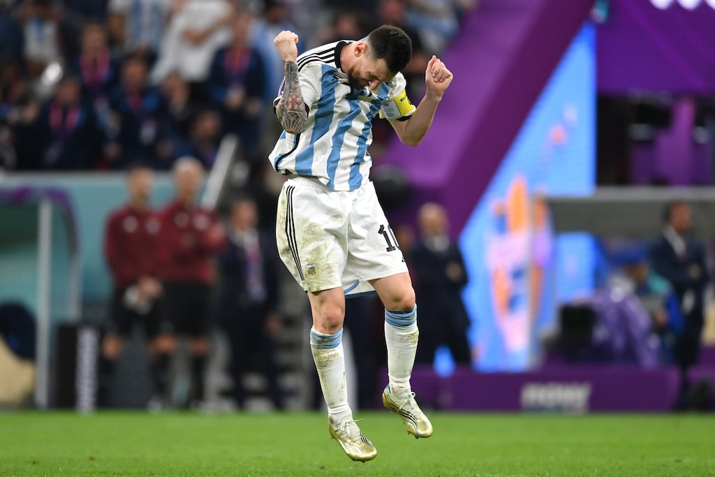 Lionel Messi celebrates scoring the team's first penalty in the penalty shootout in quarter-finals against Netherlands at Lusail Stadium, in Lusail City, Qatar. Photogaph: Dan Mullan/Getty Images
