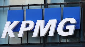 KPMG plans merger of UK and Swiss businesses