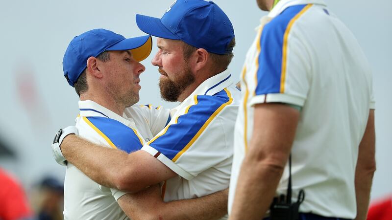 Lowry of Ireland and McIlroy embrace after the defeat on Sunday. Photo: Warren Little/Getty Images
