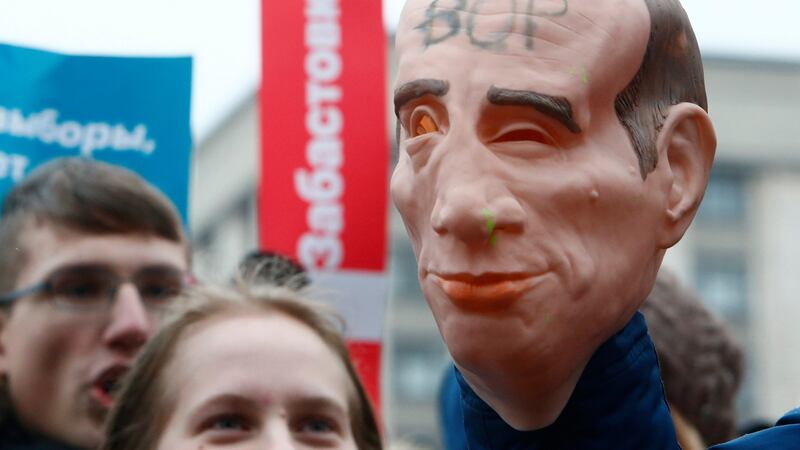 A mask depicting Russian president Vladimir Putin with the word “thief” is seen during a rally in Moscow by supporters of opposition leader Alexei Navalny, calling for a boycott of the March 18th presidential election. Photograph: Sergei Karpukhin/Reuters