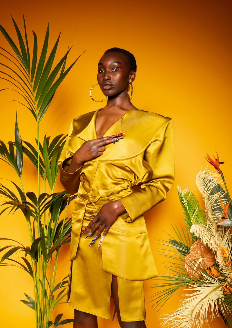 Drawstring split jacket and curve split skirt by Richard Malon; hoop earrings, stylist’s own. Nail - Countess Markievicz photography portrait