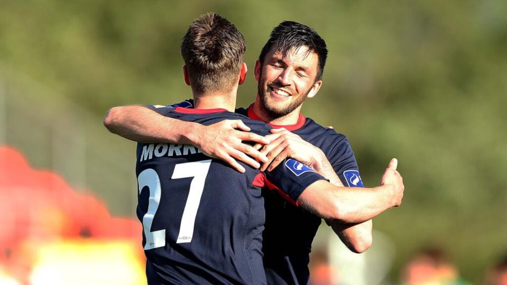 Ian Morris and Killian Brennan celebrate after St Patrick’s Athletic penalty shootout win over Shamrock Rovers which saw them reach the League Cup final. Photograph: Inpho