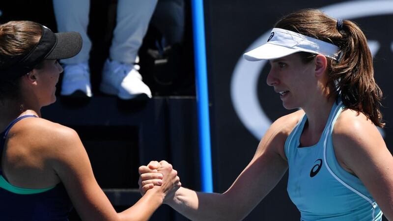 Johanna Konta congratulates Bernarda Pera after the American’s victory in Melbourne. Photograph: Greg Wood/AFP