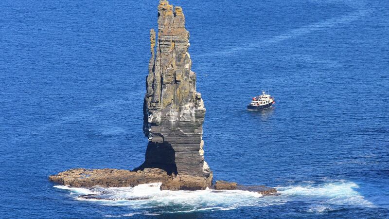 Seaside adventures: a boat off Loop Head peninsula in Co Clare