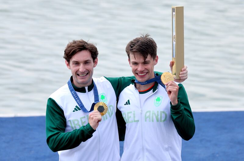 Paul O’Donovan and Fintan McCarthy with their gold medals. Photograph: James Crombie/Inpho