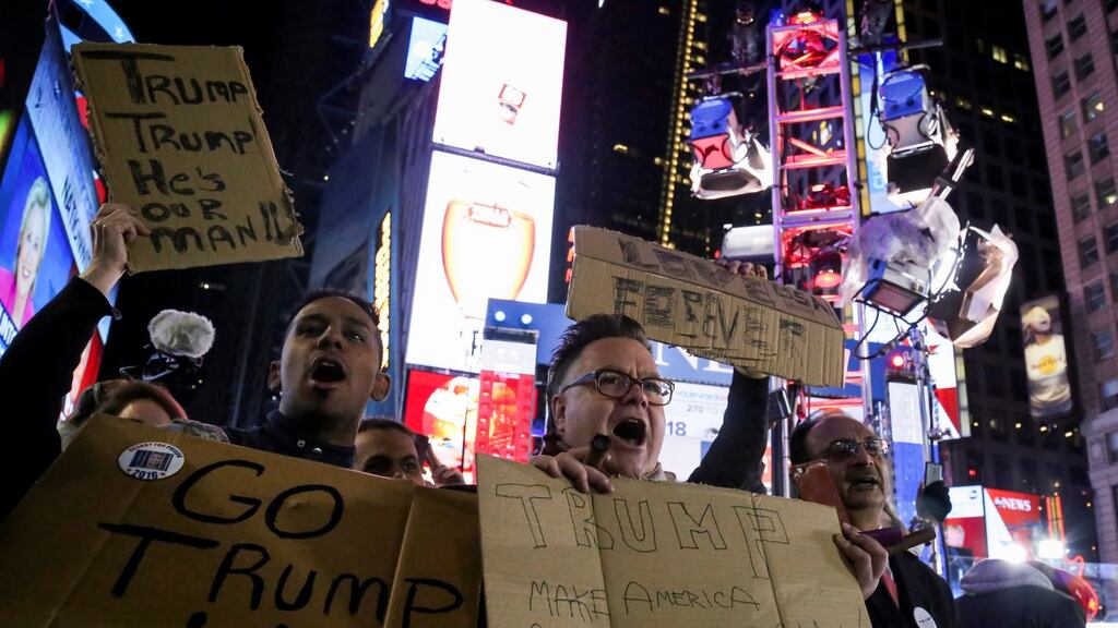 Celebrations in Times Square, Manhattan,  early on Wednesday. Photograph: Reuters/Bria Webb