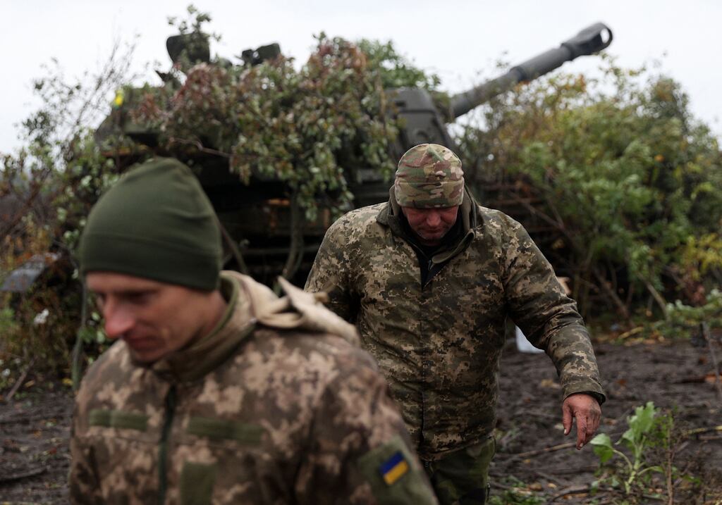 Ukrainian artillerymen walk away from their self-propelled gun after firing at a Russian position in the Donetsk region on October 11th, 2022. Photograph: Anatolii Stepanov/AFP