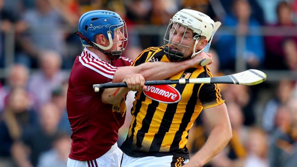 Kilkenny’s Eoin Kenny with Westmeath’s Sean Quinn. Photo: Oisin Keniry/Inpho