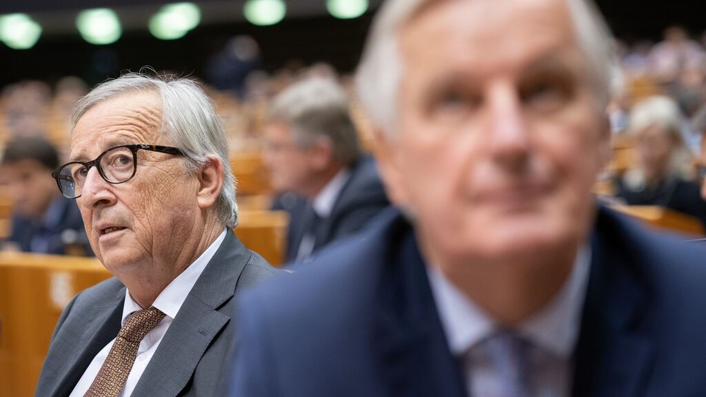 Jean-Claude Juncker, president of the European Commission, beside Michel Barnier, the EU’s chief Brexit negotiator, at the European Parliament in Brussels on Wednesday. Photograph: Jasper Juinen/Bloomberg