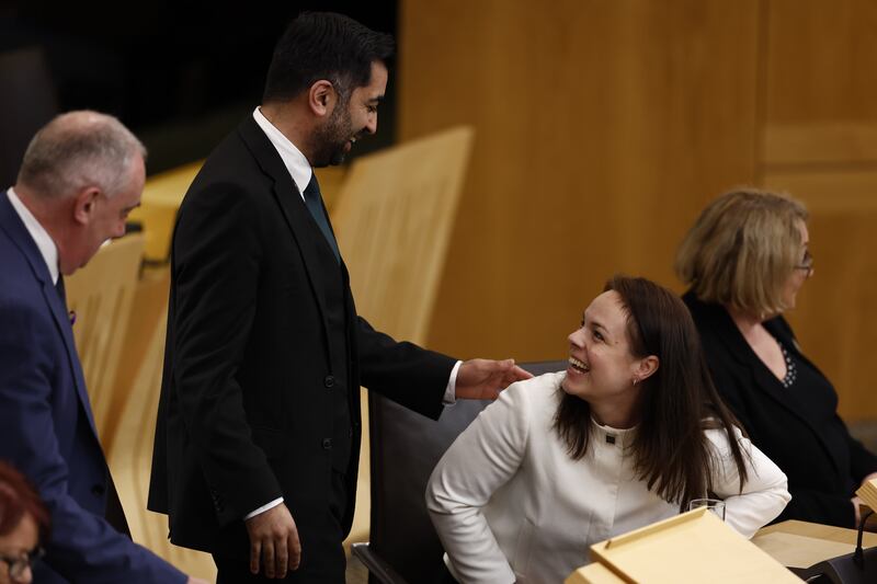 Humza Yousaf greets Scottish National Party (SNP) leadership candidate Kate Forbes in the Scottish Parliament in March. Photograph: Jeff J Mitchell/Getty Images