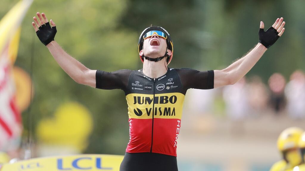 Belgian rider Wout Van Aert of the Jumbo Visma team celebrates as he crosses the finish line and wins the 11th stage of the Tour de France  from Sorgues to Malaucene. Photograph: Christophe Petit-Tesson/EPA